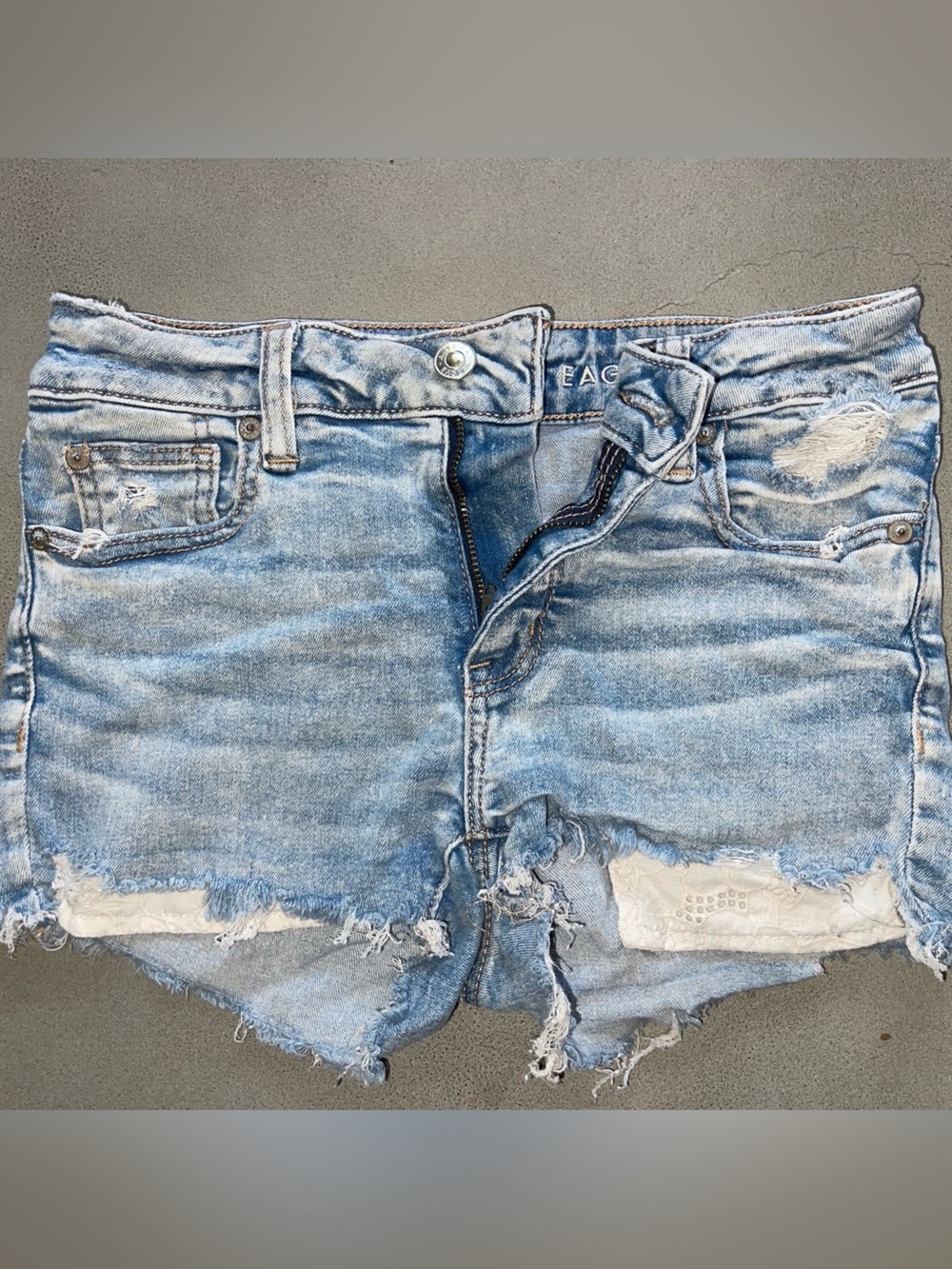American Eagle Outfitters Faded Light Blue Distressed Denim Shorts